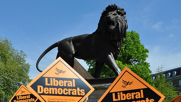 Lib Dem placards in front of the Maiwand Lion